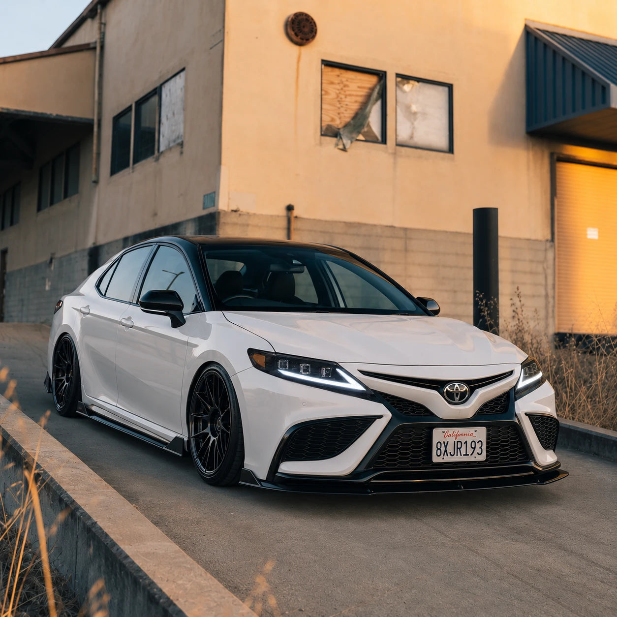 2018-2024 Toyota Camry LED Triple Projector Headlights — driving in the sunset  — H-CAM18-SWD-A