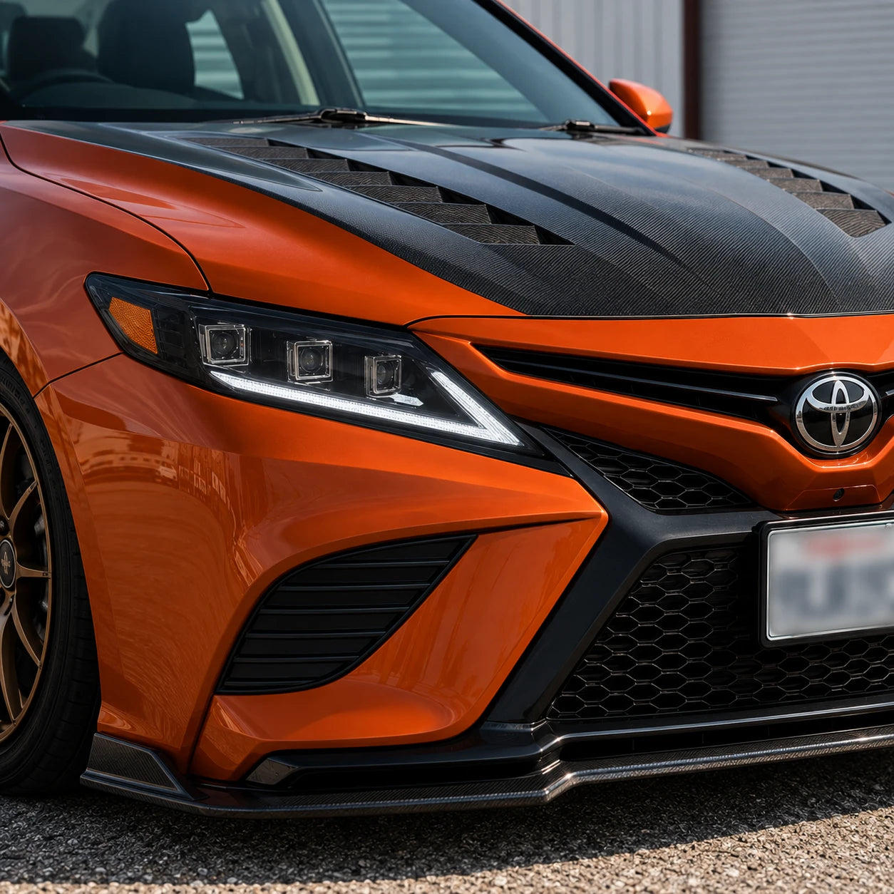 2018-2024 Toyota Camry LED Triple Projector Headlights — lights-on front view  — H-CAM18-SWD-A