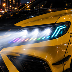 2018-2024 Toyota Camry LED Triple Projector Headlights — lights-on close-up — H-CAM18-CRGB
