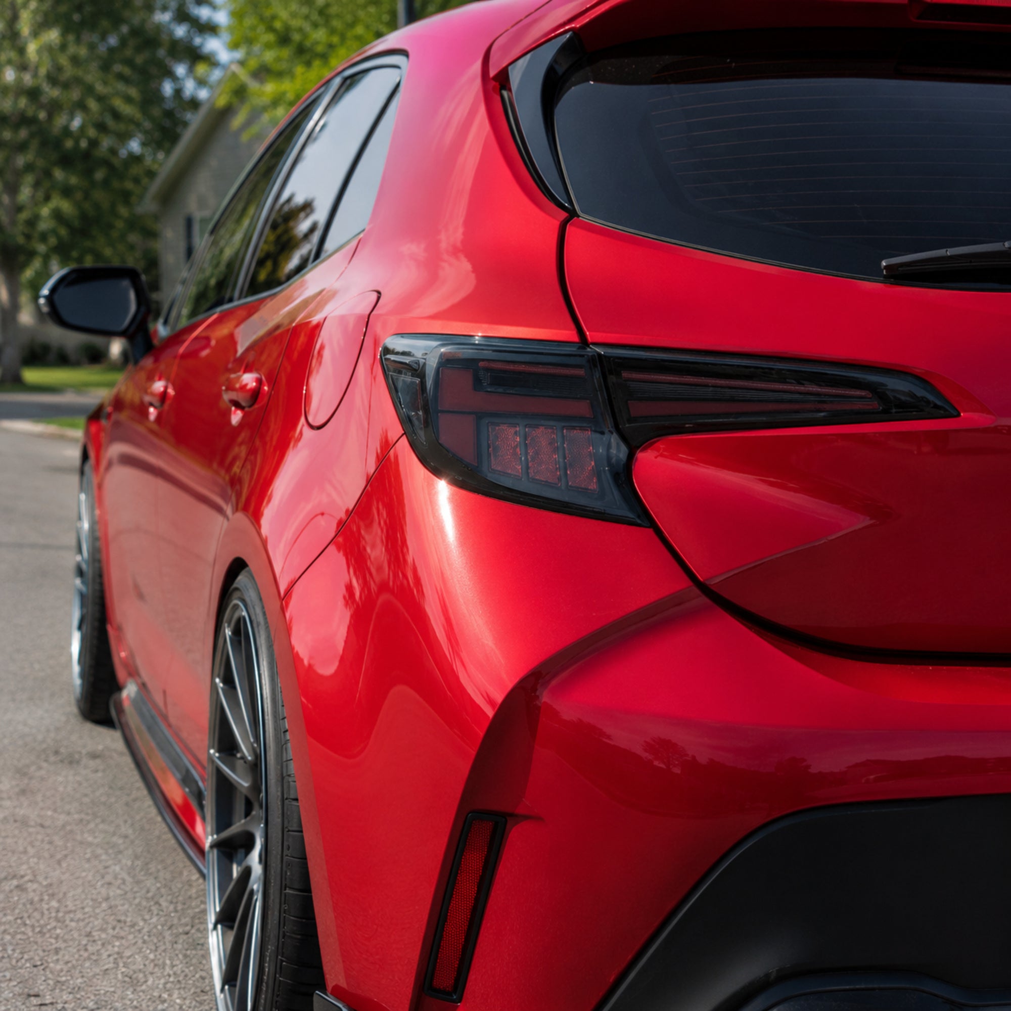 2019-2025 Toyota Corolla Hatchback & GR Corolla Sequential LED Tail Lights — smoked red day unlit exterior — T-COR19