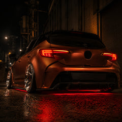 2019-2025 Toyota Corolla Hatchback & GR Corolla Sequential LED Tail Lights — smoked red low angle rear scene — T-COR19