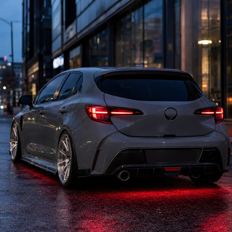 2019-2025 Toyota Corolla Hatchback & GR Corolla Sequential LED Tail Lights — smoked red street rear view — T-COR19