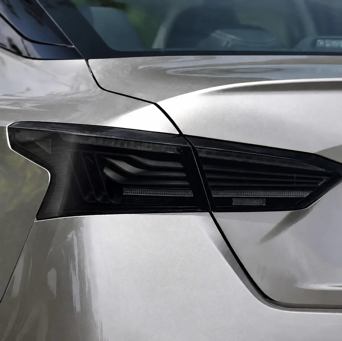 2019-2026 Nissan Altima Sequential Laser LED Tail Lights Assembly — 4-Piece Set — smoked lens lights off close-up — T-ALT19-SRGB