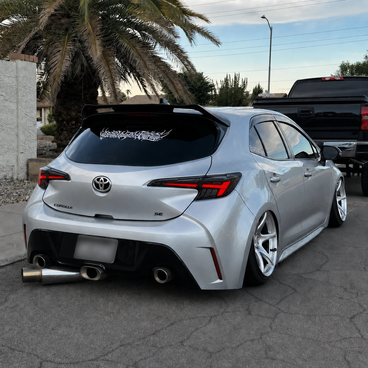 2019-2026 Toyota Corolla Hatchback and GR Corolla Sequential LED Tail Lights — parking in the street — T-COR19-SW
