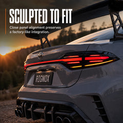 2020-2026 Toyota Corolla Sedan Sequential LED Tail Lights Assembly Full-Width Bar — sunset close-up view — T-COR20-SWT