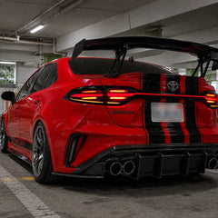 2020-2026 Toyota Corolla Sedan Sequential LED Tail Lights Assembly Full-Width Bar — parking lot view — T-COR20-SWT