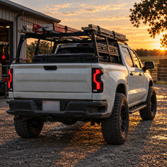 2019-2026 Chevrolet Silverado 1500 / 2020-2023 2500HD/3500HD Sequential LED Tail Lights — full rear truck view at sunset — T-SILV19-SR